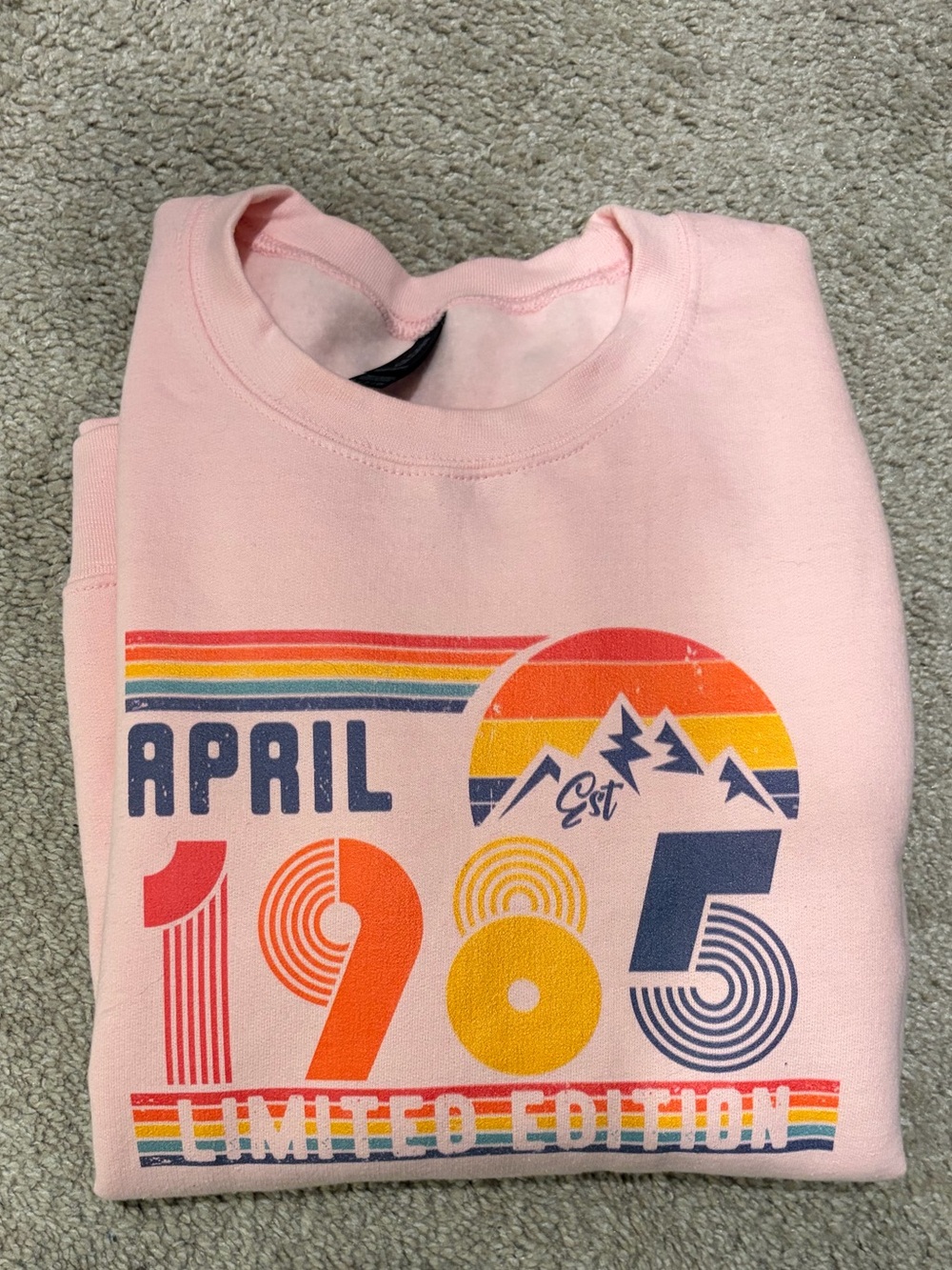 Gildan Pink Sweatshirt with Retro Rainbow 'April 1985' Graphic